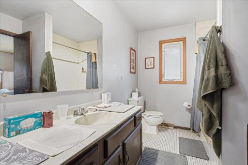 Upstairs full bathroom_6515 Fridley St NE