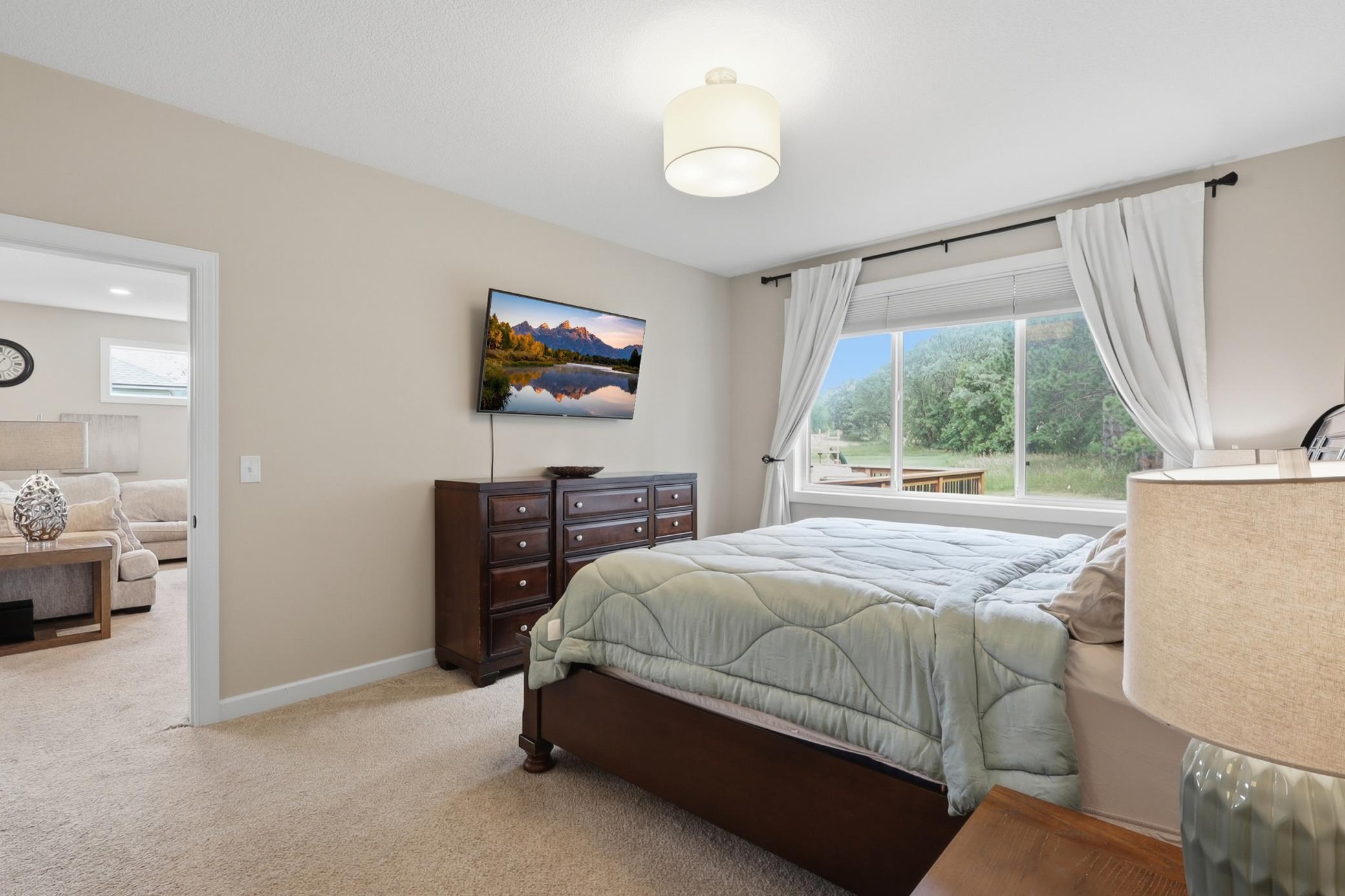Main Level Primary Bedroom with Full Dual Sink On Suite and Walk In Closet