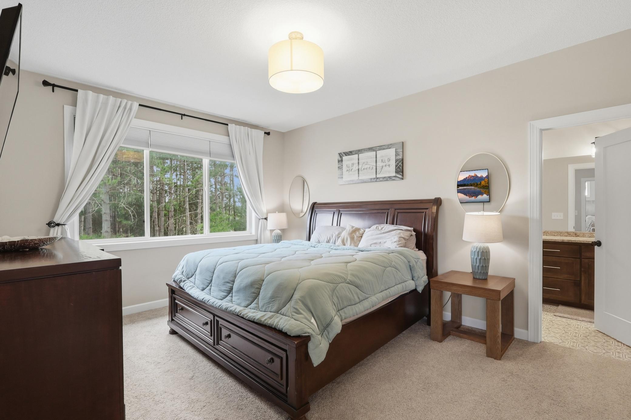 Main Level Primary Bedroom with Full Dual Sink On Suite and Walk In Closet