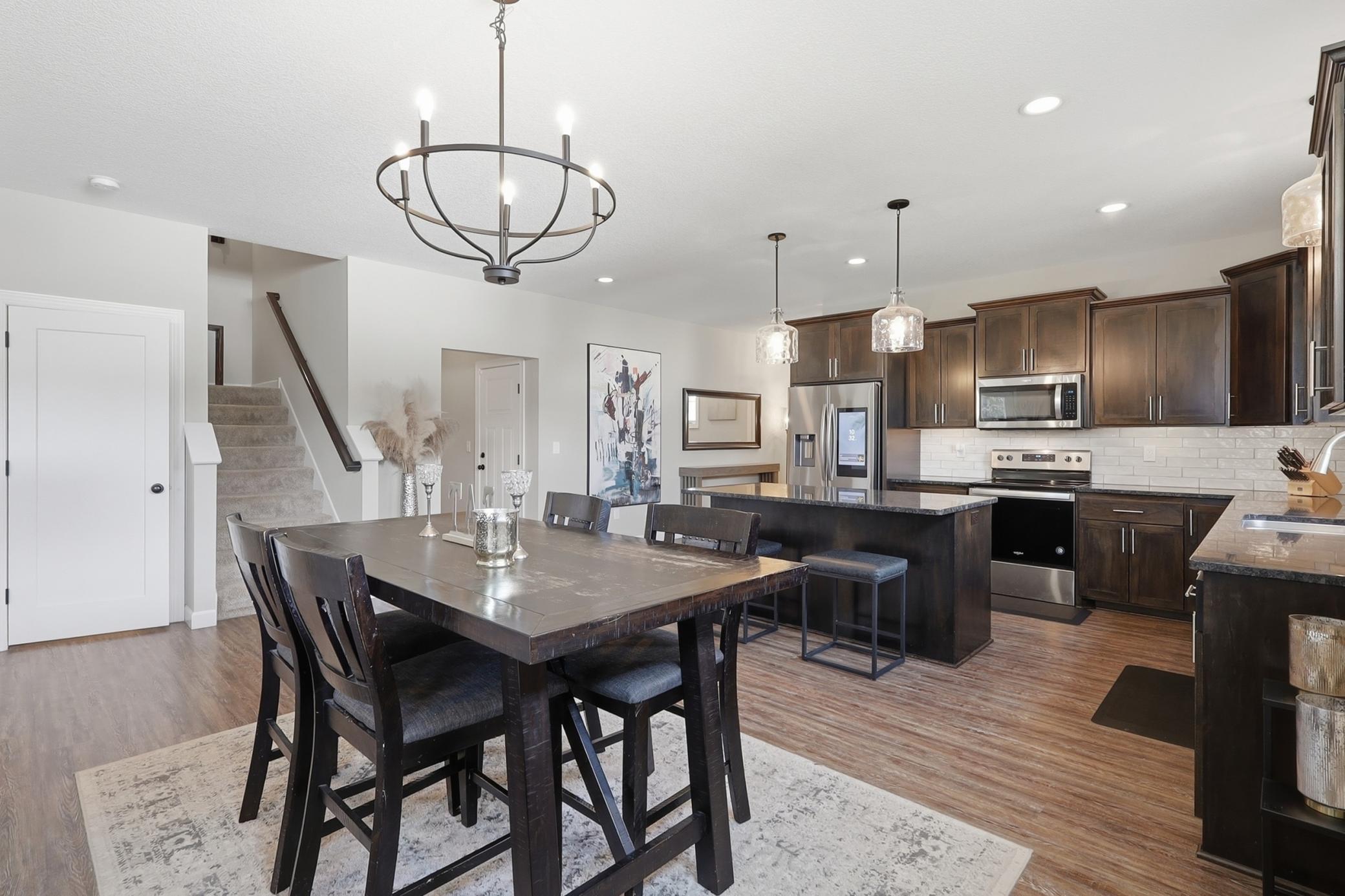Open-concept floor plan featuring a stunning wall of windows that fills the home with natural light!