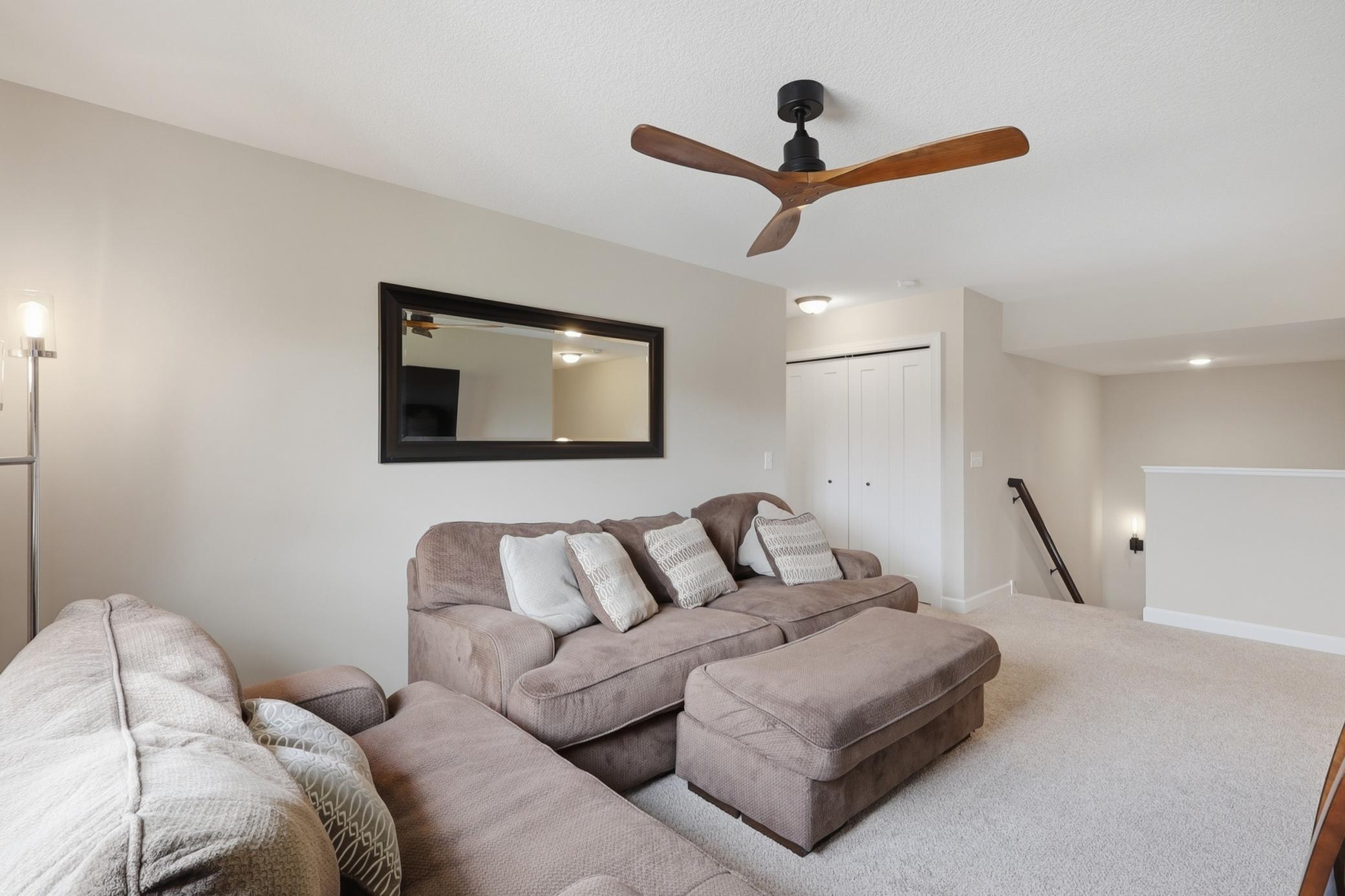 Versatile loft that's perfect for a family room, home office, or play area