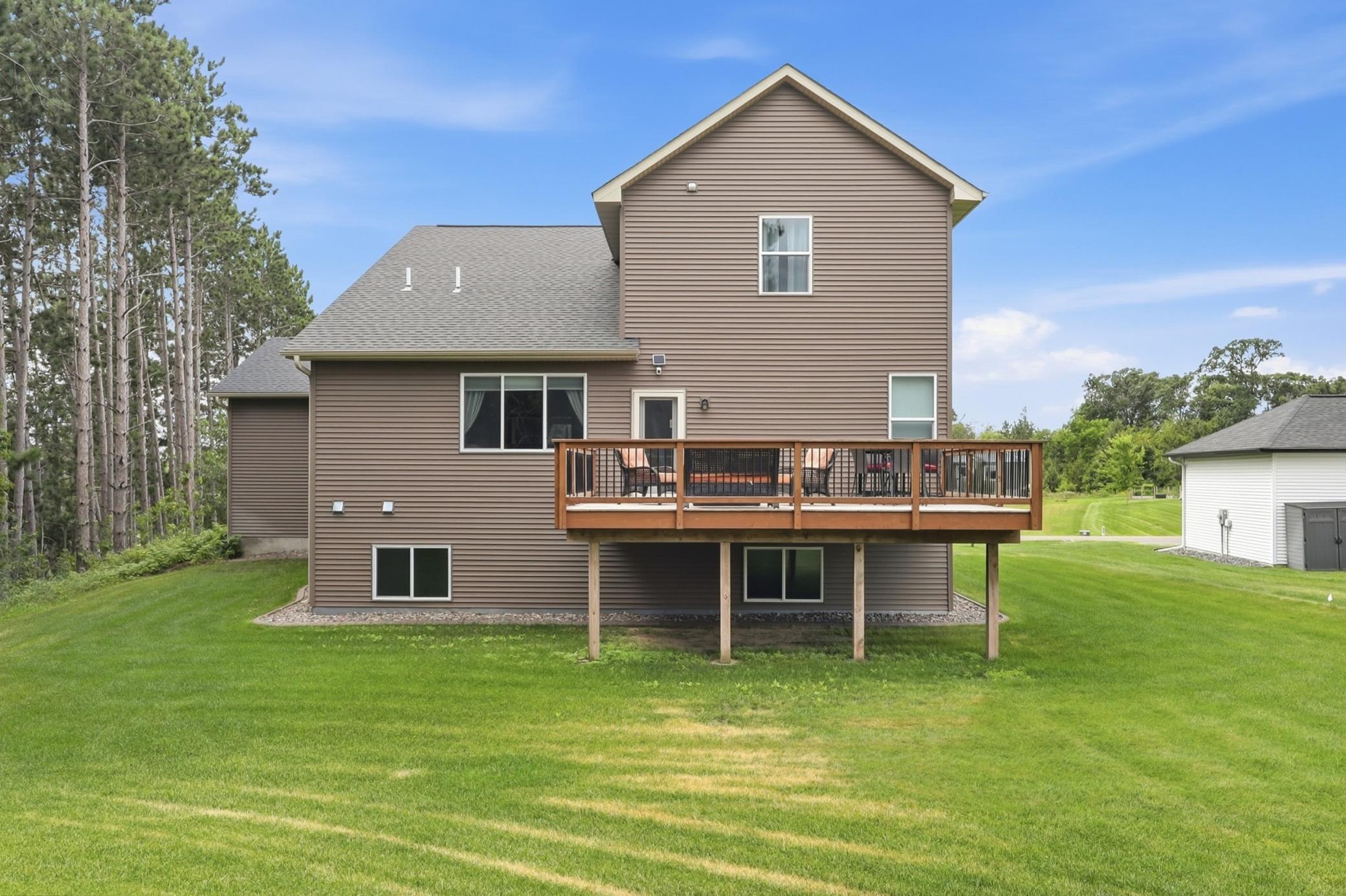 Perfectly situated on a picturesque .65-acre cul-de-sac lot