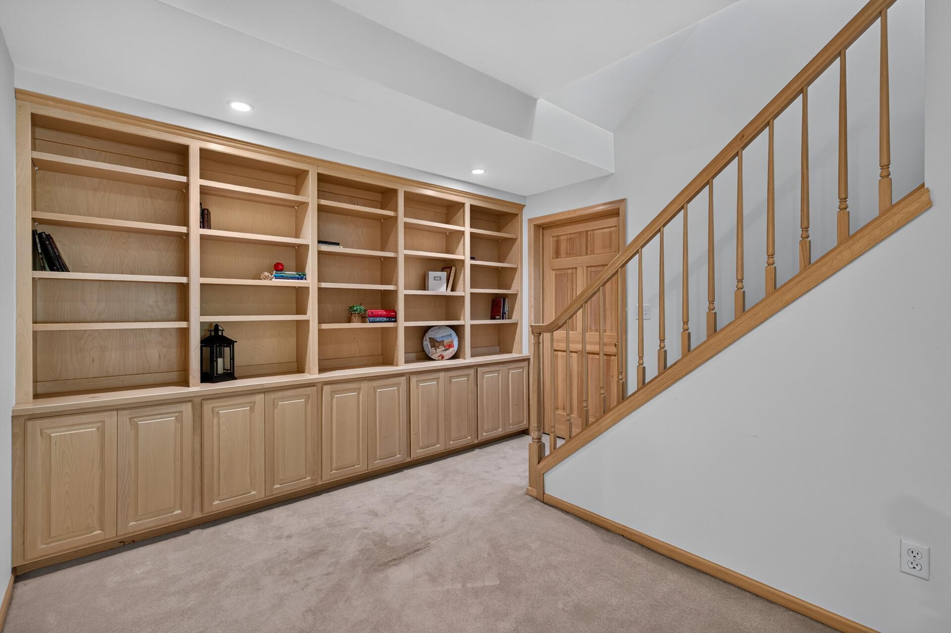 The walkout lower level has beautiful built in storage.