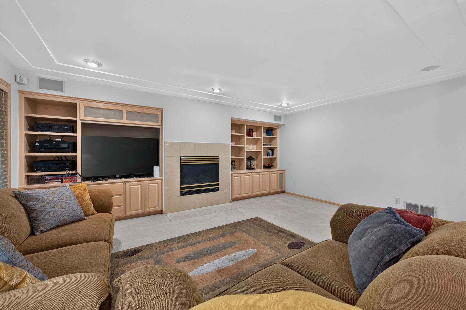 Gas fireplace and built in sound system make for a great entertaining space any time of year!