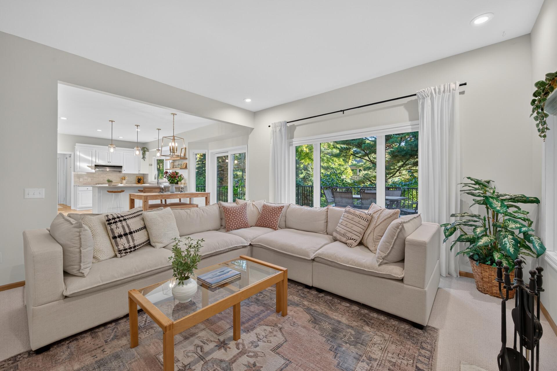 The open concept floor plan flows directly into the casual dining space and newly updated kitchen.