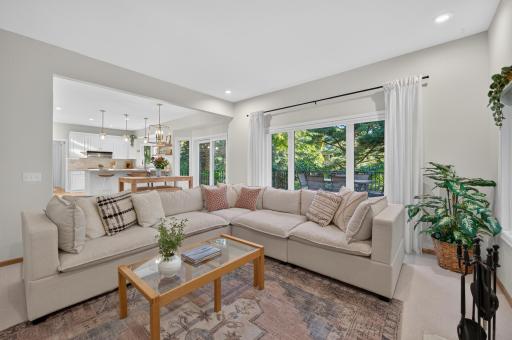 The open concept floor plan flows directly into the casual dining space and newly updated kitchen.