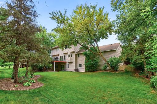 This lovely flat lot has the perfect amount of play space surrounded by trees.