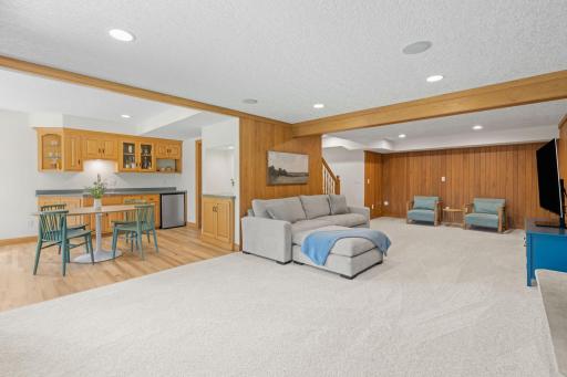 The lower level isn't your typical basement. It's filled with natural light from the large windows and walkout access to the backyard.