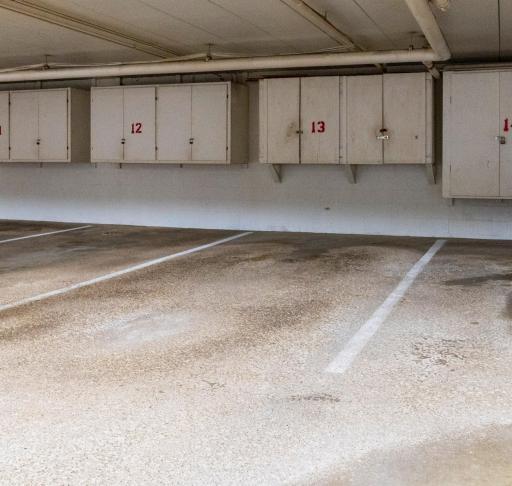 Garage spot 13 with storage cabinets.jpg