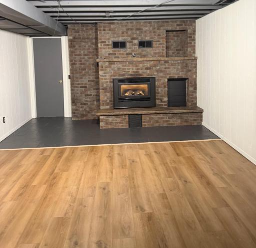 Lower level family room with gas fireplace