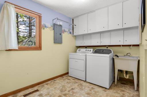 The foyer & garage access provide convenient, separate access to the finished laundry room, making daily routines easier and keeping the main living areas organized.