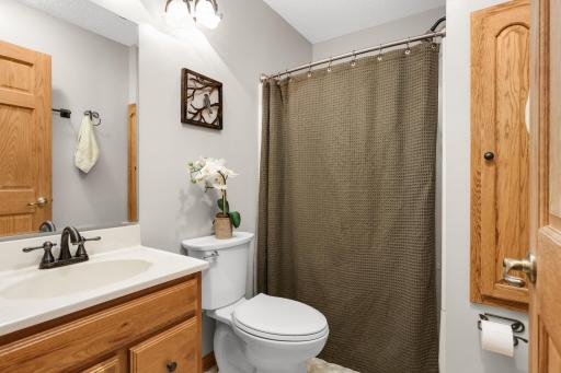 Convenient access to a half bathroom off of the foyer and family room.