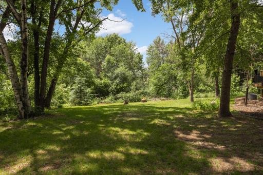 Beautifully situated on a private 1-acre lot backing to an agricultural lot and surrounded by peaceful natural views.