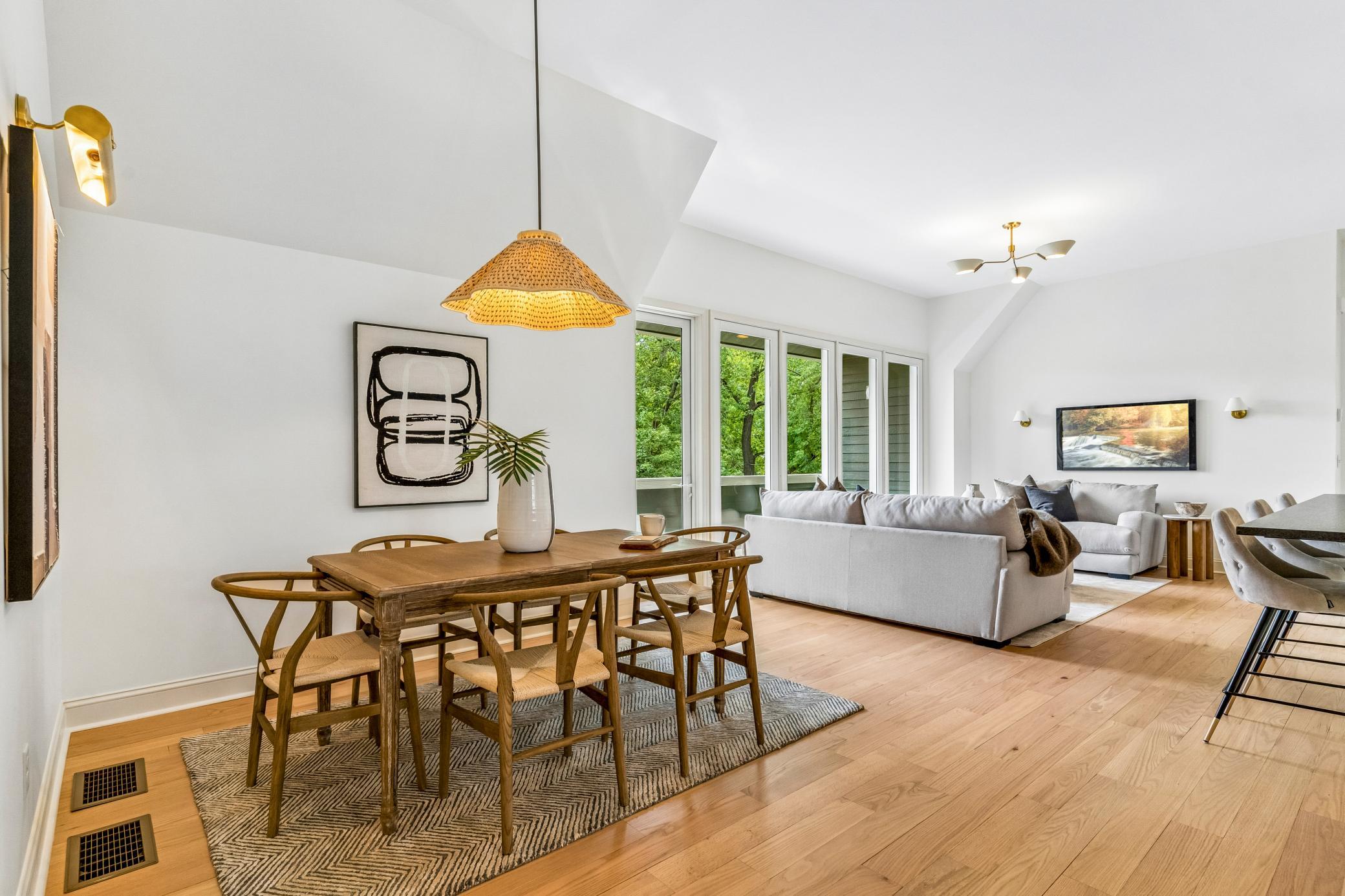 Dining space with hardwood floors and natural light