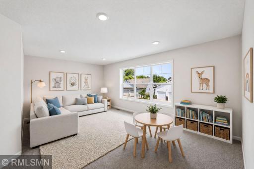 Virtually Staged - Generous upper-level loft offering flexible living or play space