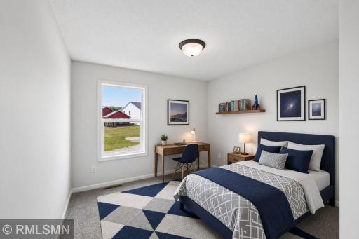 Virtually Staged - Spacious secondary bedroom with room for a desk or additional furniture
