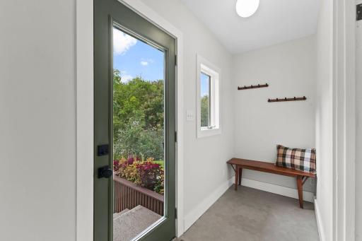 Light-filled foyer is welcoming and a great transition to the interior of the home.