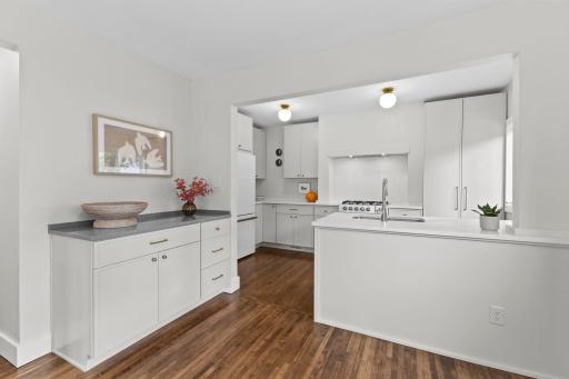 Open-concept kitchen and main living area flow together for modern family living.