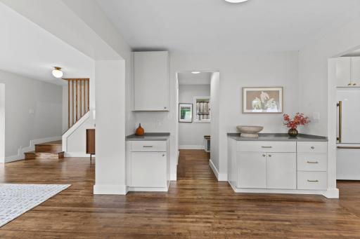 Open kitchen seamlessly integrates with dining and living spaces for easy living. So much storage!
