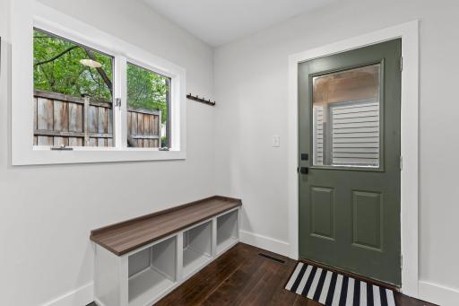 Back entry bench with storage keeps the foyer organized and welcoming.