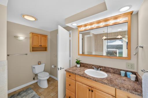 Good size vanity-Tile floors and shower