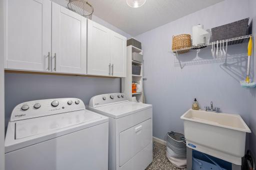 The upper level also hosts the laundry room which is super convenient close to the bedrooms.
