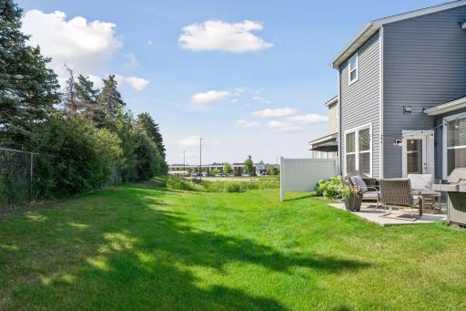 The back of the home features a privacy with a wooded field and low road noise.
