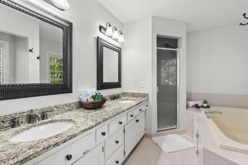Dual sinks in primary suite bathroom