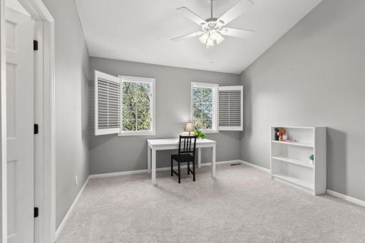 Third bedroom upstairs with vaulted ceiling