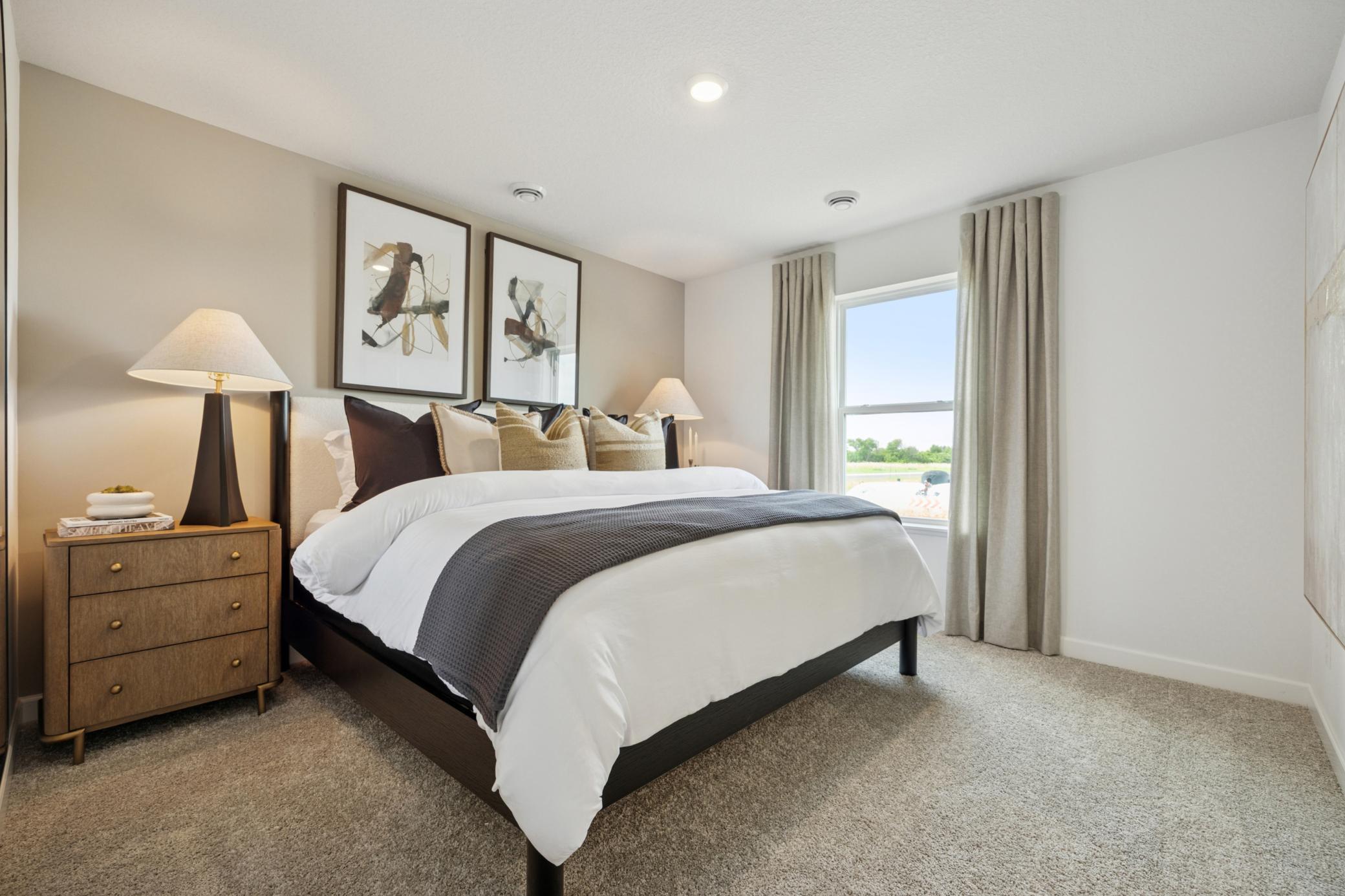 (Photo of a decorated model. Features and finishes will vary.) The owner's bedroom!