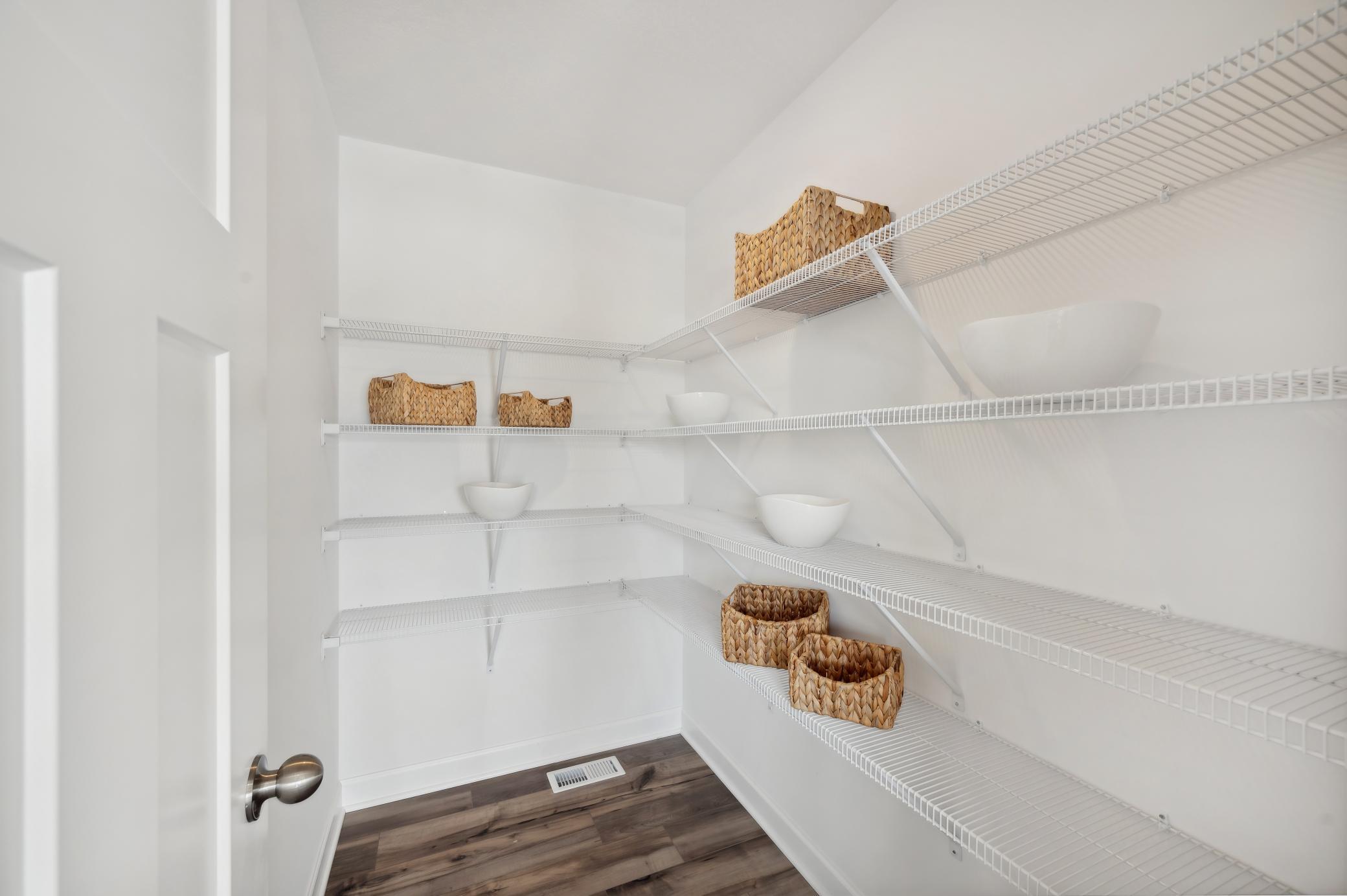 (Photo of model home, finishes will vary) This home features a huge walk in pantry!