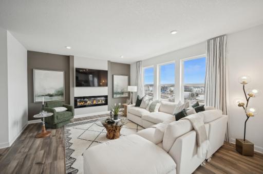 (Photo of model home, finishes will vary) Another angle of this bright and spacious family room!