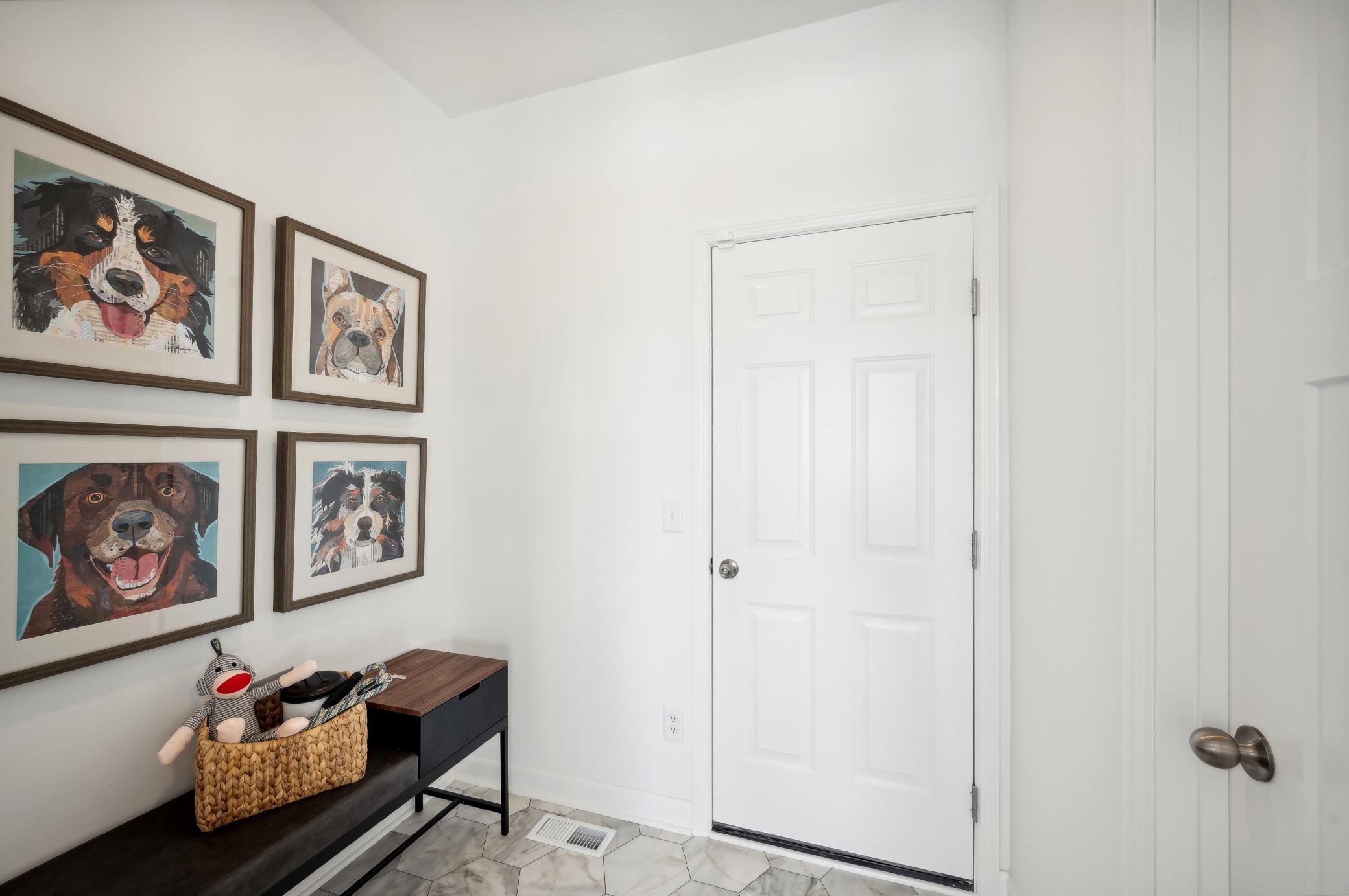 (Photo of model home, finishes will vary) A mudroom to keep you organized!