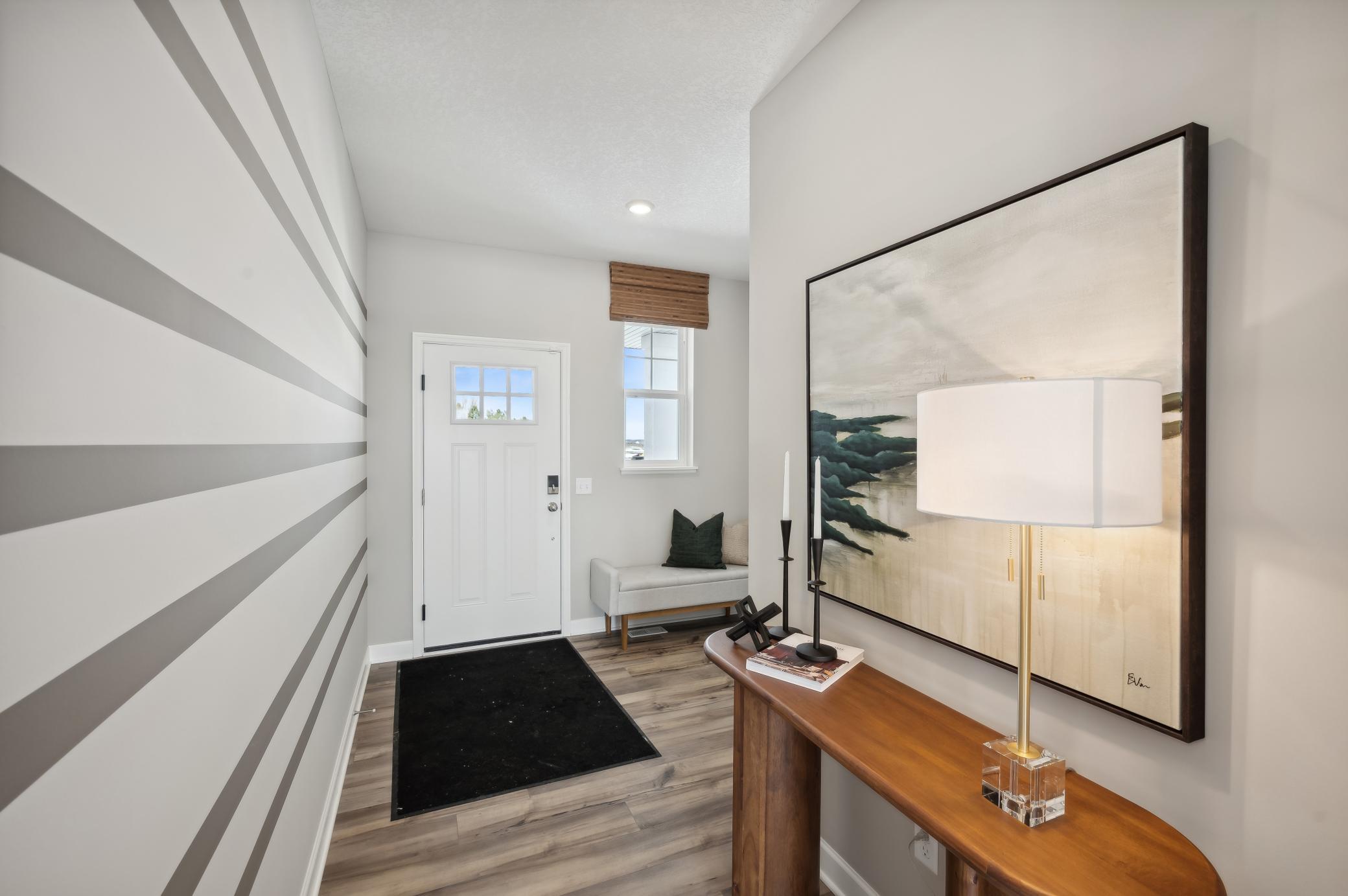 (Photo of model home, finishes will vary) The entry way into the home!