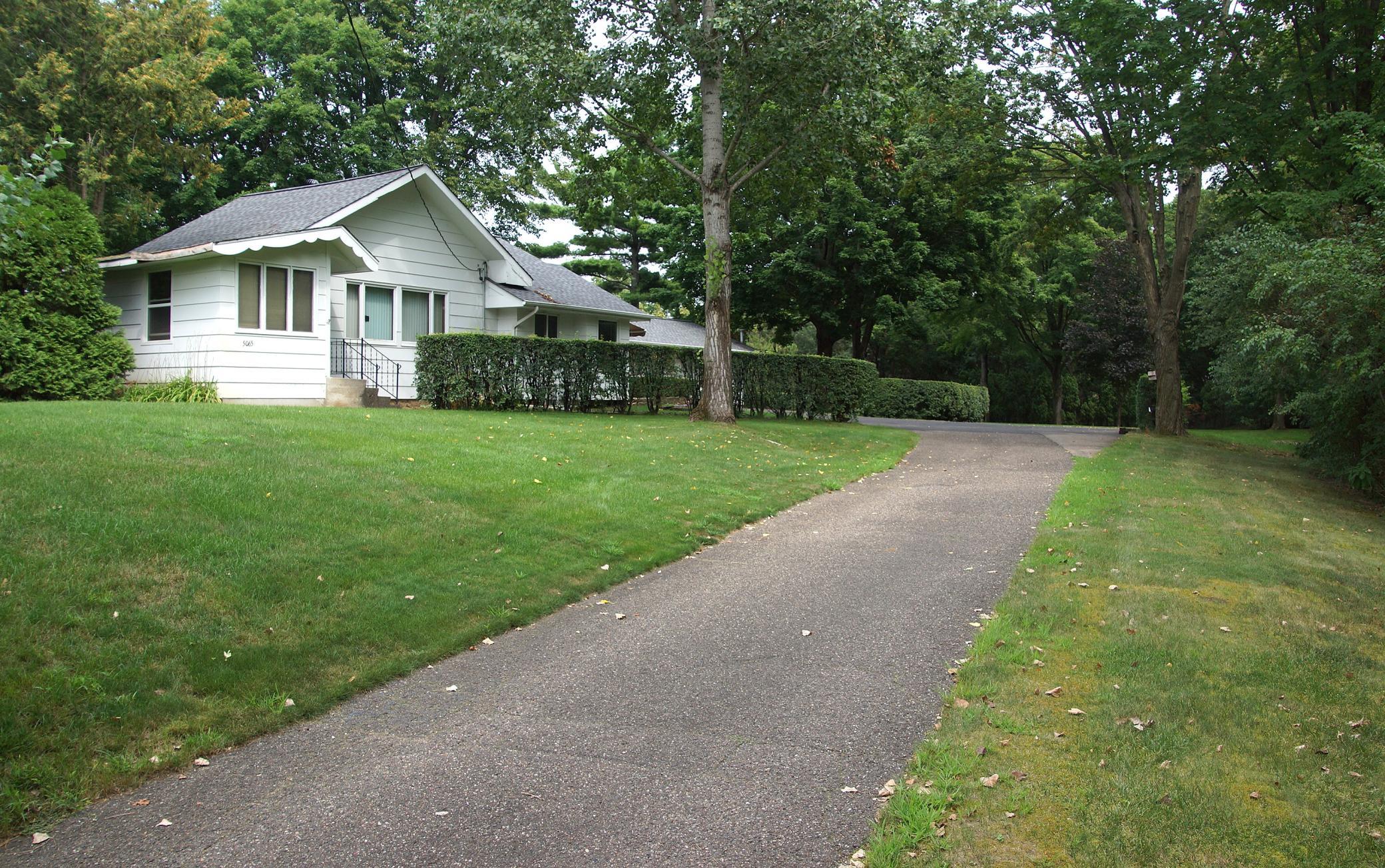 Current home on .94 acre very private lot. Value is in the land.