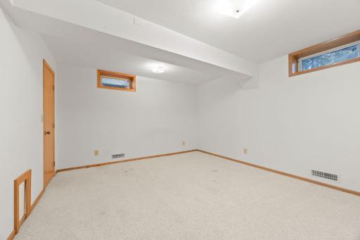 Lower level office/ bedroom with addition of egress.