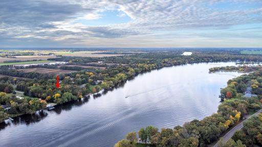 Aerial view showcasing the beautiful waterfront location and surrounding scenery.