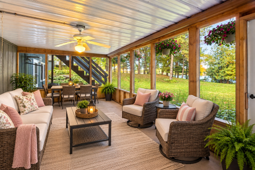 Relax and enjoy the outdoors from this spacious screened in porch with beautiful views of the Mississippi river.. Virtually Staged