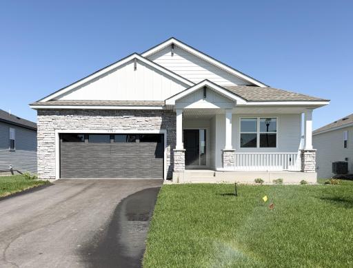 Welcome to 5182 Long Pointe Bay! (Photo is of the actual home.)