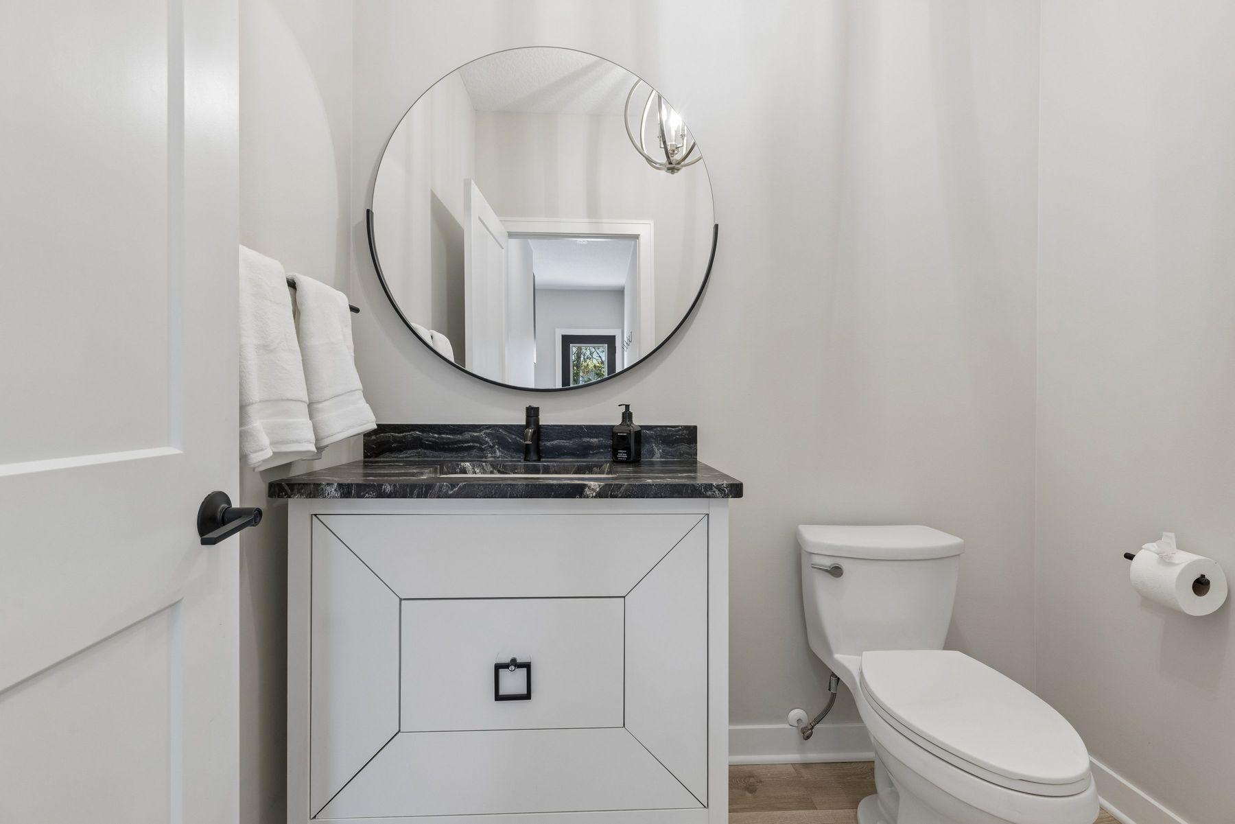 The half bathroom off the mudroom is ideal for entertaining guests outside