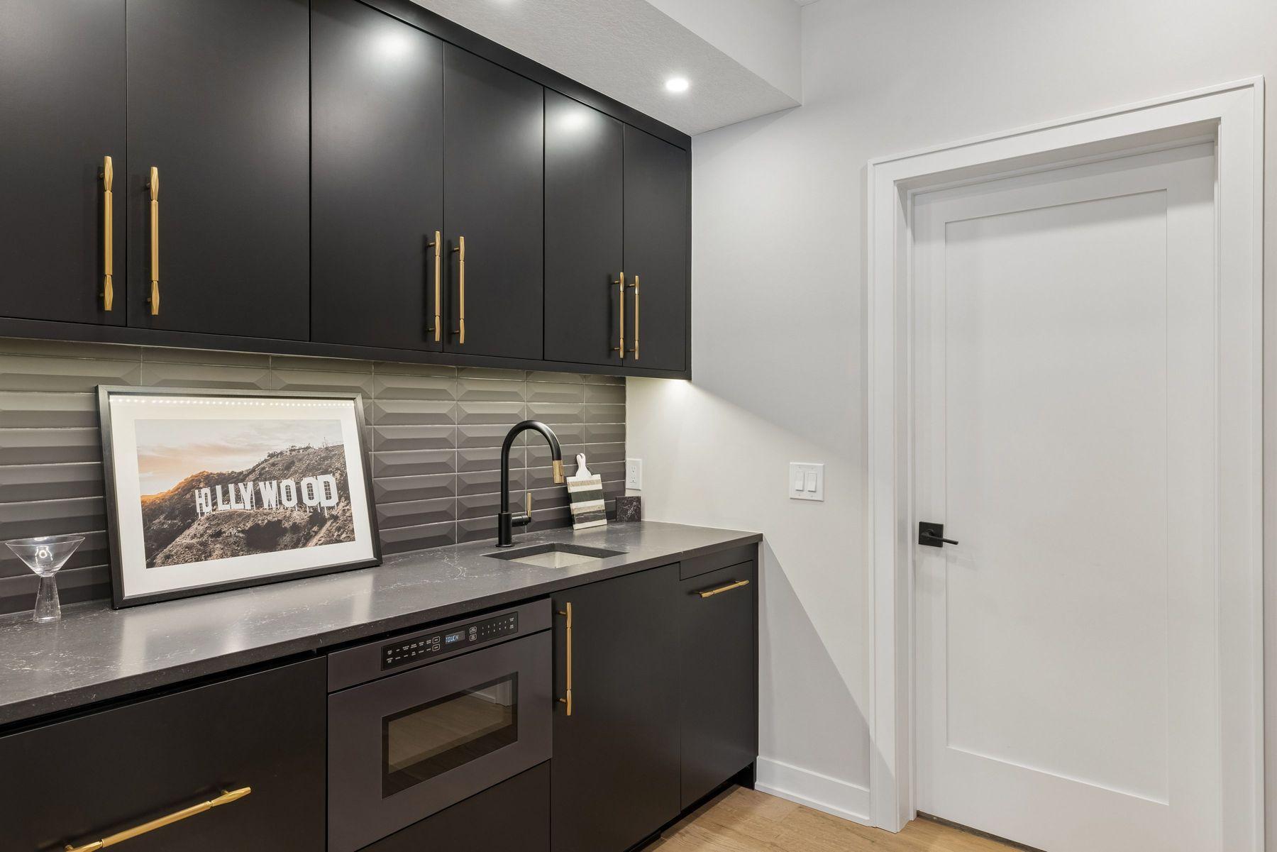 The lower level with full kitchenette is ideal for guests