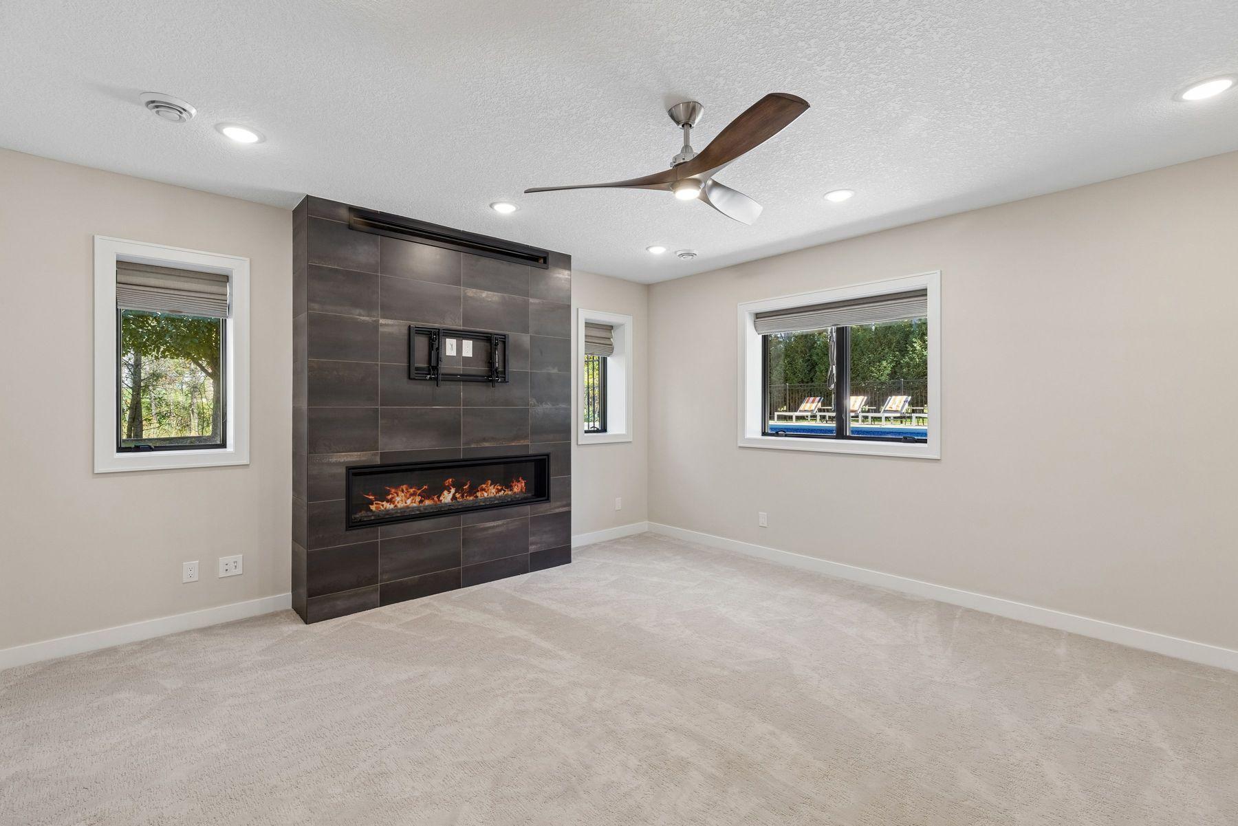 The lower level offers another gas fireplace