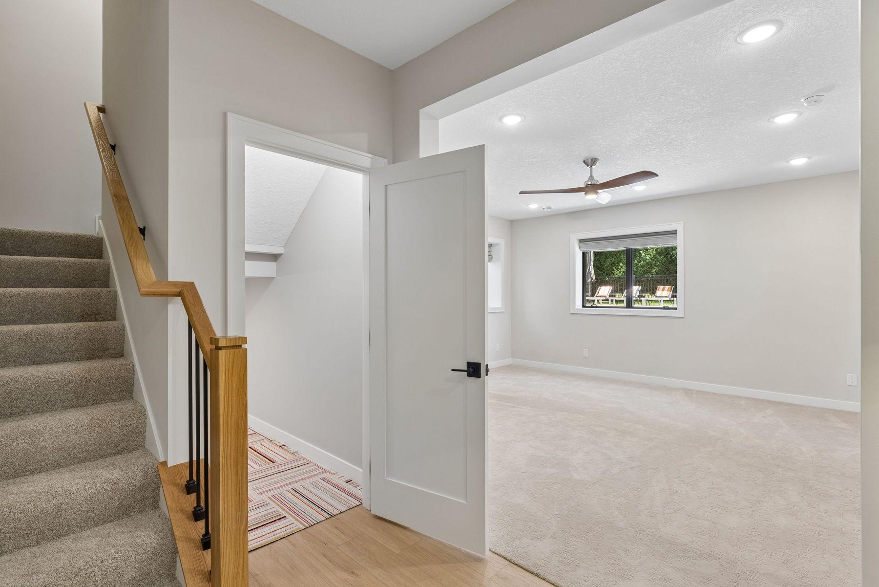 Darling area under the stairs for play or more storage