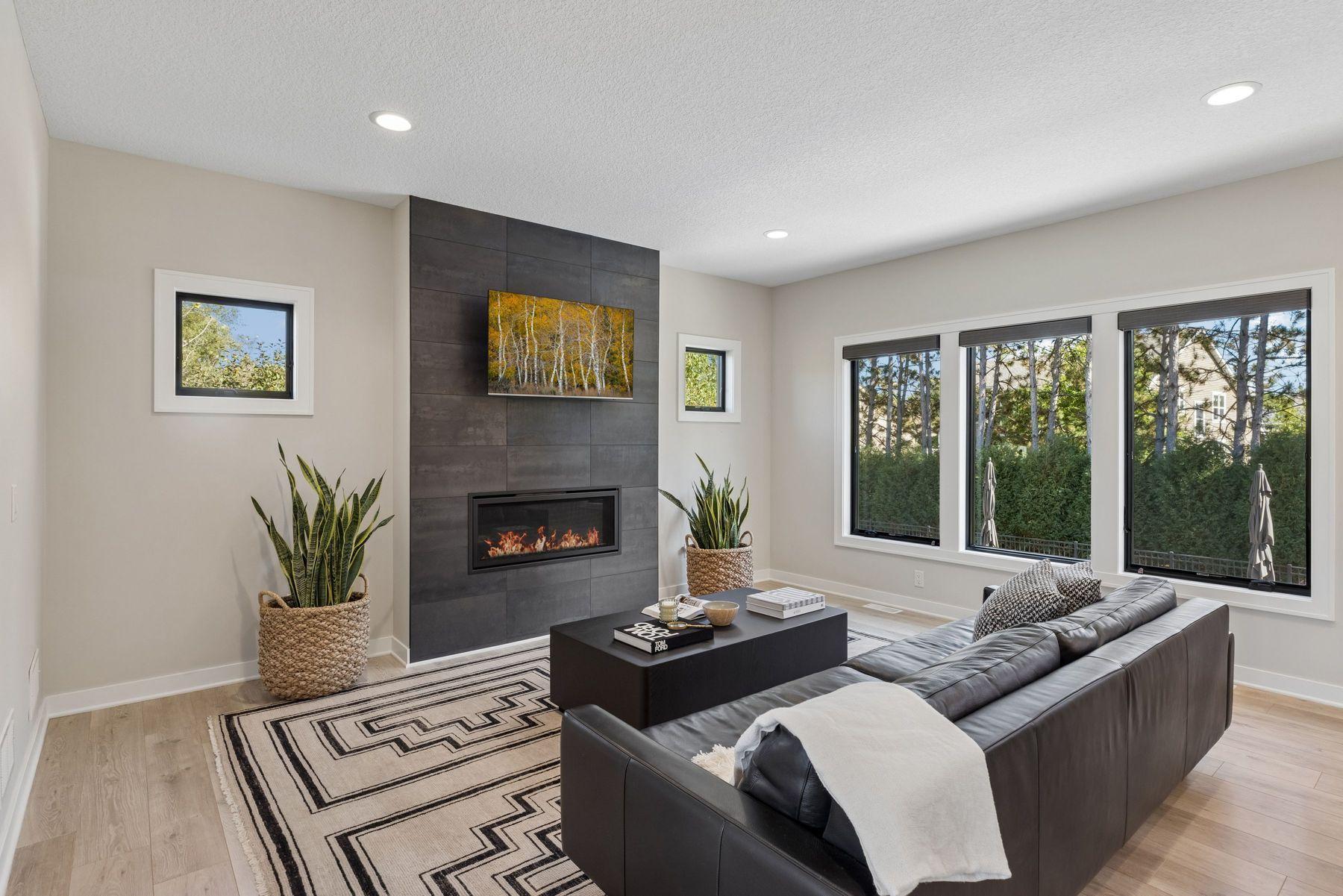Living room has a gas fireplace