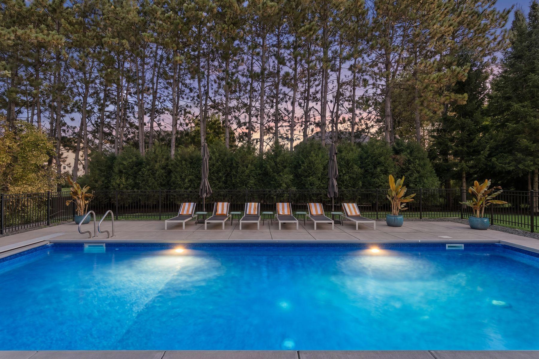 This lovely property is enveloped in mature trees