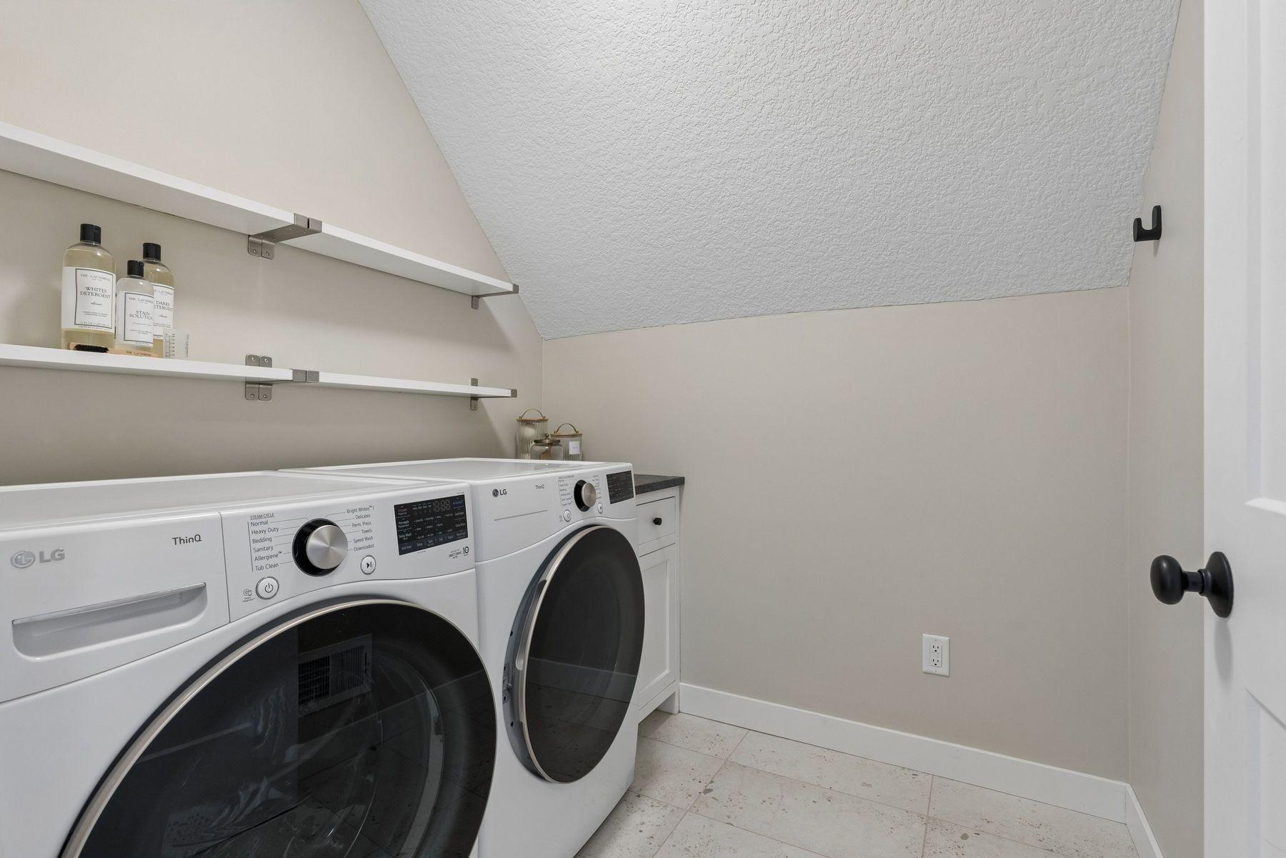 Laundry conveniently located on the upper level