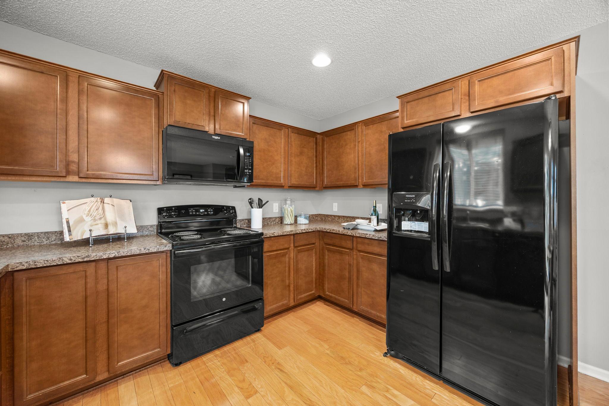 Enjoy sleek appliances and abundant cabinetry.