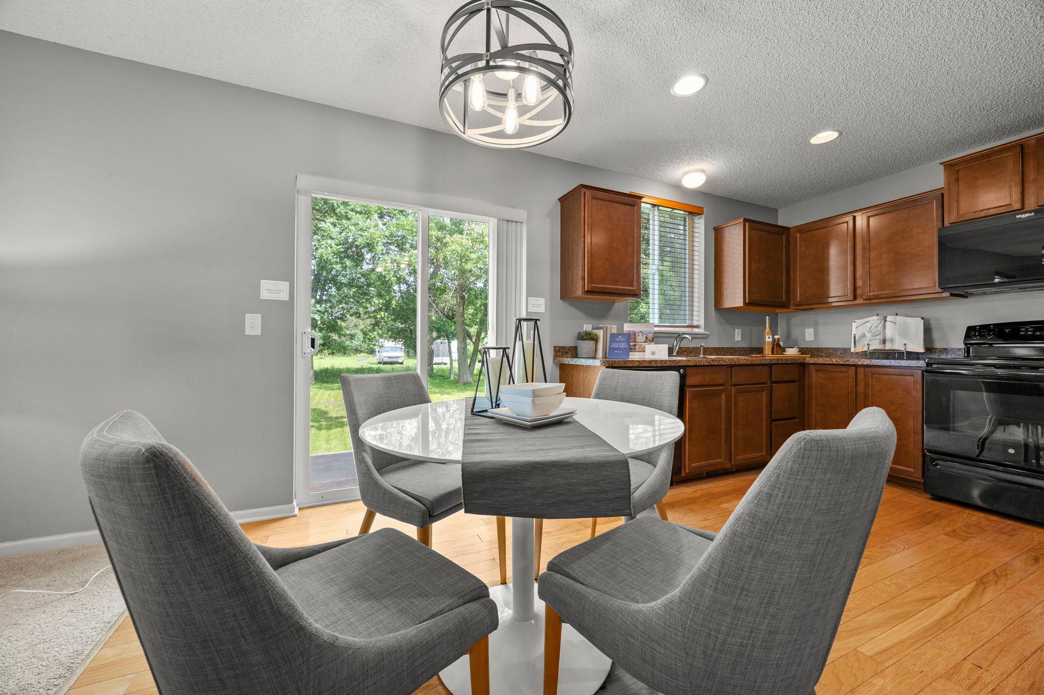 Connects seamlessly to the dining area with updated statement lighting (2026).