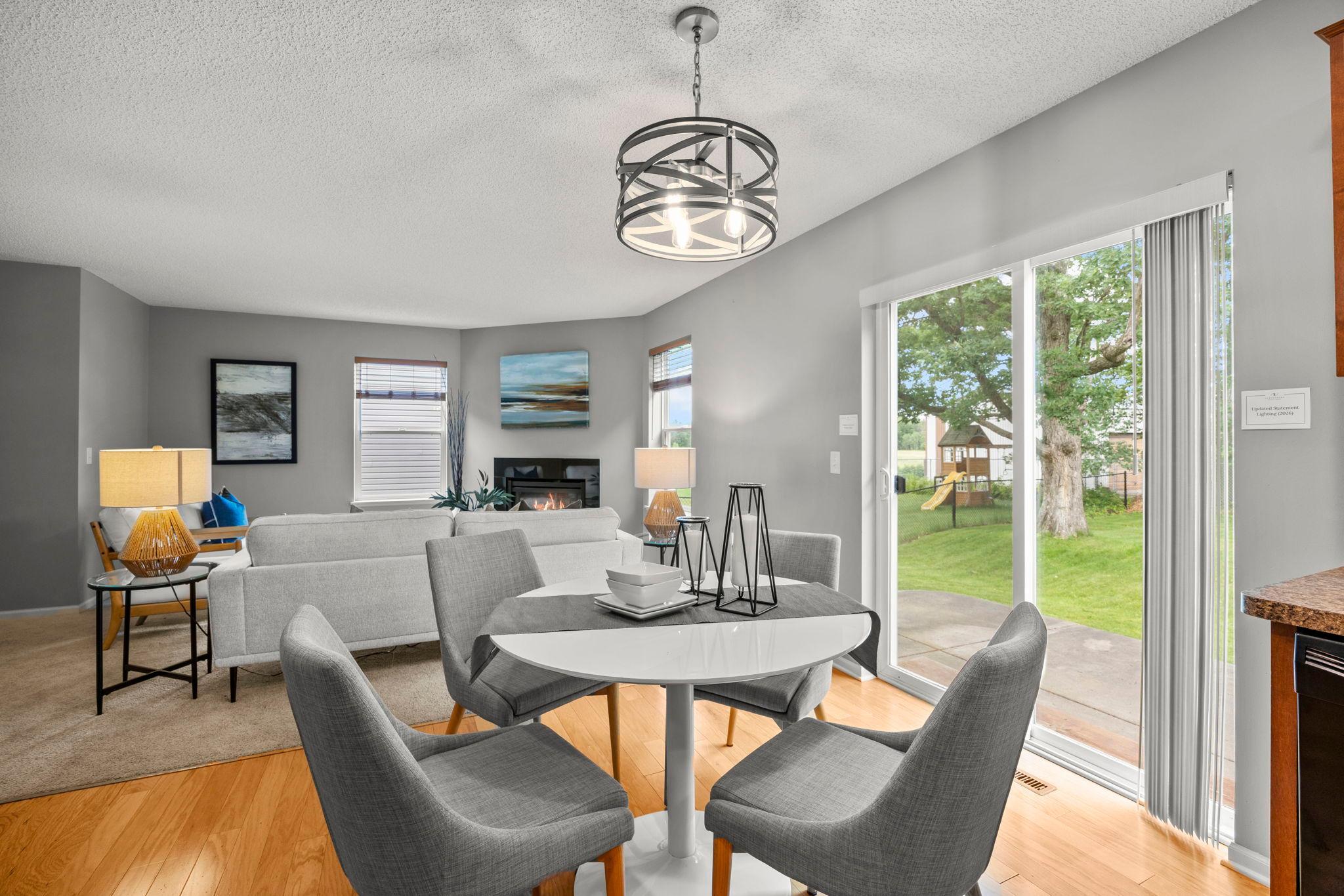 From here, step directly out to the back patio, perfect for enjoying meals or relaxing outdoors.