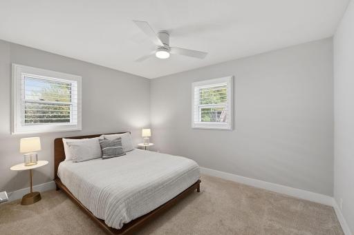 Your second bedroom on the main level features custom closet shelving as well.